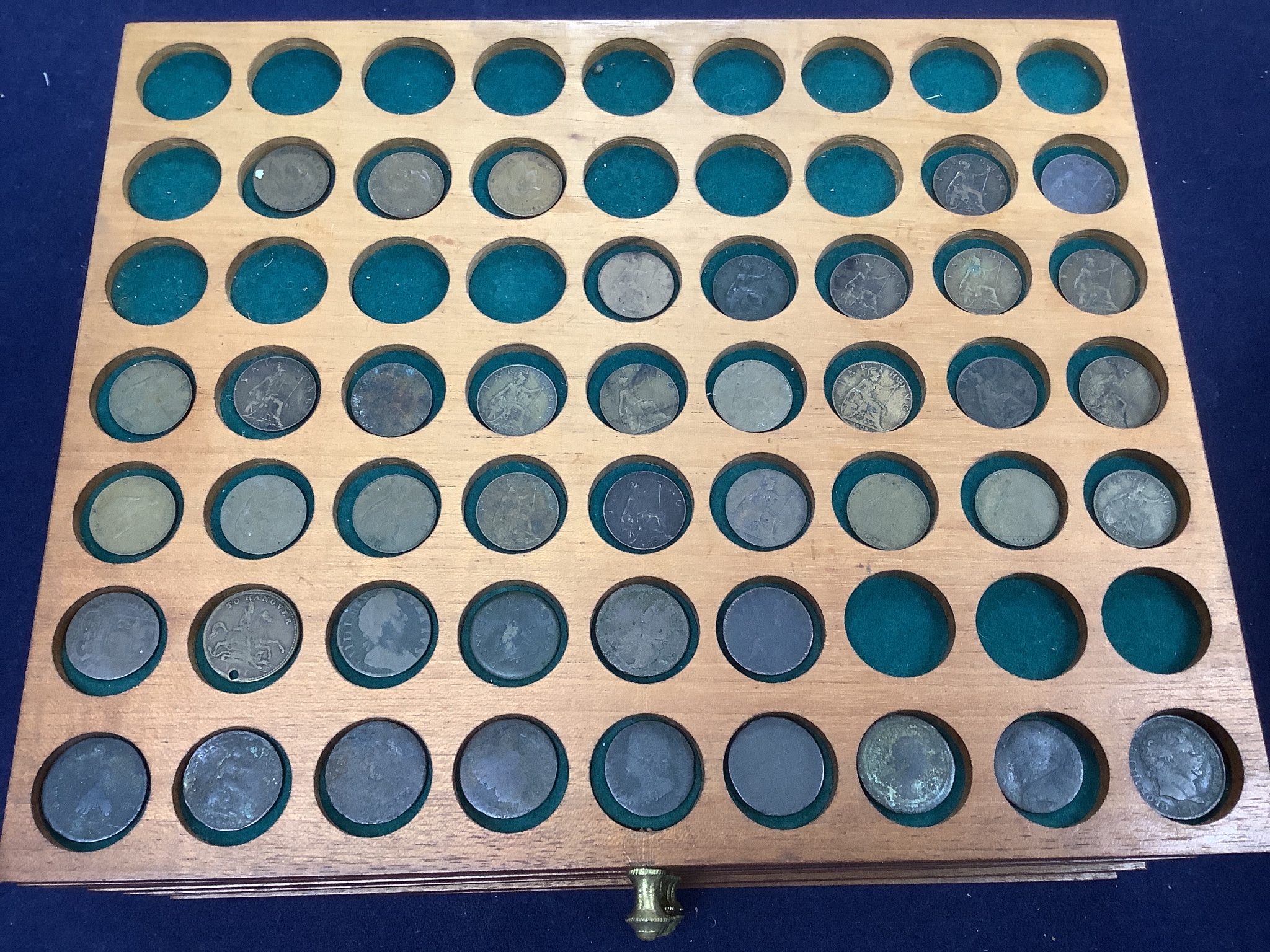 A coin collection in a coin collector's case, 30 x 26 x 17cm